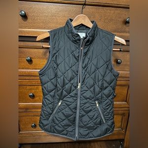 Ladies Black vest in great condition. Size small. Beautiful Gold detail zippers